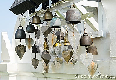 Ceremony bells with golden leaf at Temple for make lucky wishing at at the Golden Mount a Royal Thai Temple of Wat Saket. Stock Photo