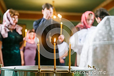 Ceremony of christening at church Editorial Stock Photo