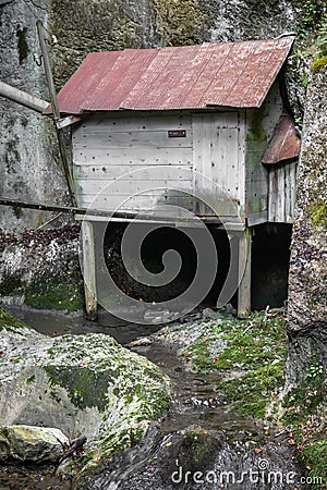 Cerkno, Slovenia - August 25, 2019 : cultural heritage of old partisan hospital Franja hidden in mountains canyons from second wor Editorial Stock Photo