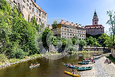 Cesky Krumlov Castle with Tower and rafting on Vltava river Editorial Stock Photo