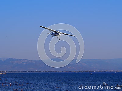 Cessna plane in flight Stock Photo