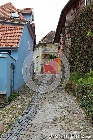 The Cetatii street is leading to the entrance to the old town in Sighisoara city in Romania Stock Photo