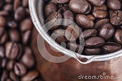 Cezve, ibrik full of coffee beans Stock Photo