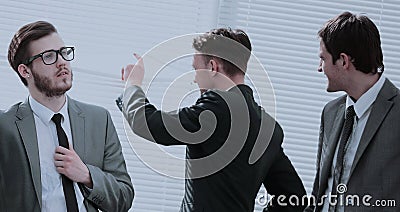 CFO and business team discuss the company`s profit in the office Stock Photo