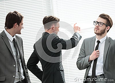 CFO and business team discuss the company`s profit in the office Stock Photo