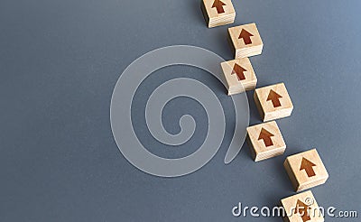 Chain of blocks of unidirectional arrows. Consistency and focus. Concept of conformism, vertical of power. Unchanging course of Stock Photo