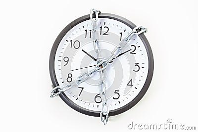 Chain holding an alarm wall clock, time management concept Stock Photo