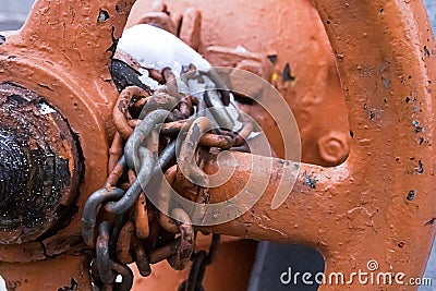 Chain of large parts weathered fixes the valve technology of fuel delivery valve closing, gas industry, blocked switch in the stre Stock Photo