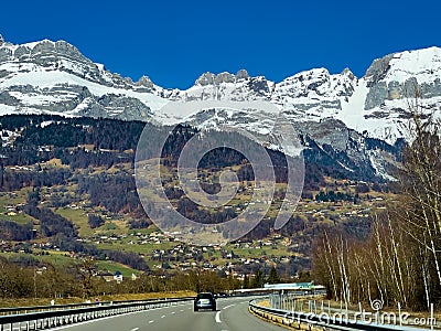 Chaine des Aravis mountains and Cordon village from A40 Stock Photo