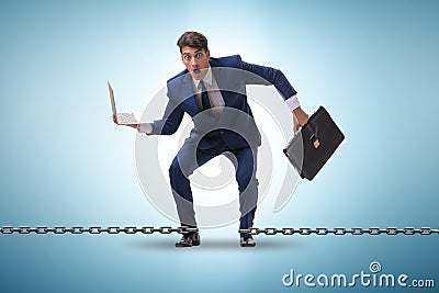 Chained businessman in workaholic concept Stock Photo