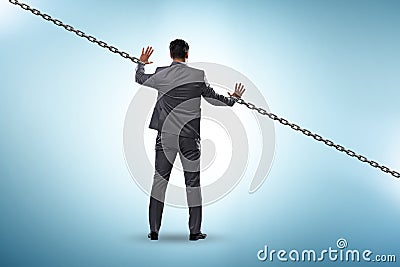 Chained businessman in workaholic concept Stock Photo