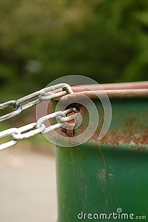 Chained Garbage Can - Portrait Stock Photo