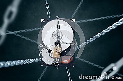 Chained hard disc drive with combination padlock. Stock Photo