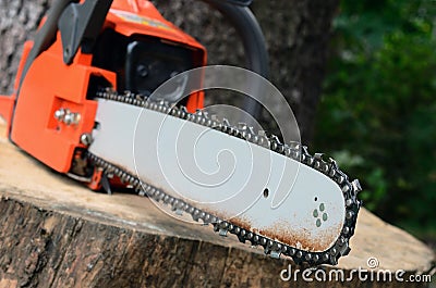 Chainsaw on the stump Stock Photo