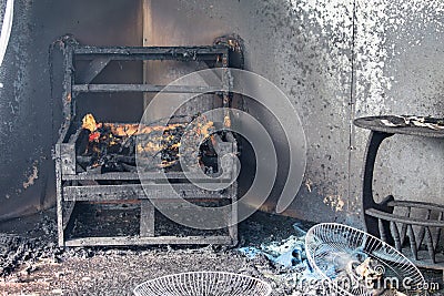 Chair and furniture in room after burned by fire in burn scene o Stock Photo