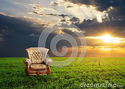 Chair on a green meadow Stock Photo