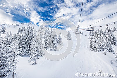 Chair lift in Tyrolian Alps in Kitzbuhel, Austria, Europe. Editorial Stock Photo