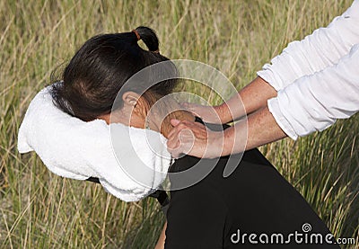 Chair massage Stock Photo