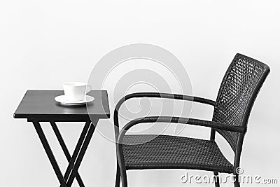 Chair, table and teacup Stock Photo