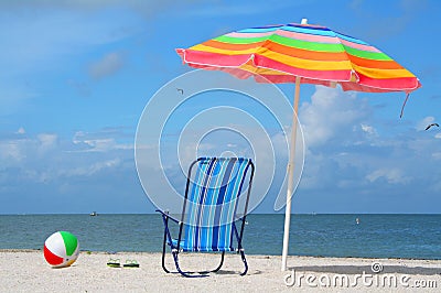 Chair, Umbrella And Ball At The Beach Royalty Free Stock Images - Image