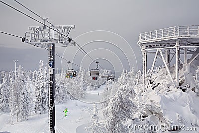 Chairlift in the ski resort `Mountain Belaya`. Russia Editorial Stock Photo