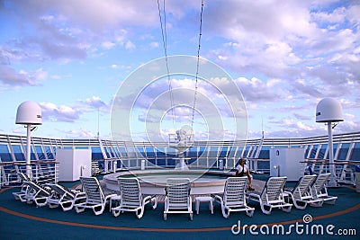 Chairs around a pool on a cruise Editorial Stock Photo