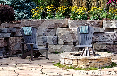 chairs and fire-pit patio Stock Photo