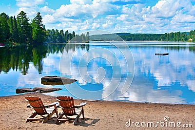 Chairs lake shore Stock Photo