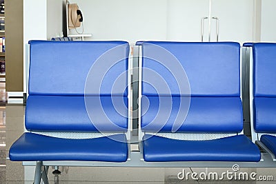 Chairs for passengers at the Terminal 1 of Changi Airport in Singapore Stock Photo