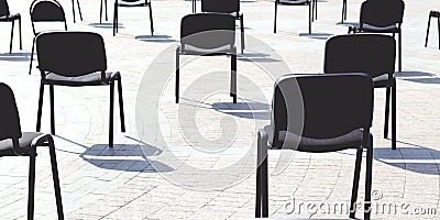 Chairs on the street are arranged in rows at a distance, keep your distance, quarantine measures Stock Photo