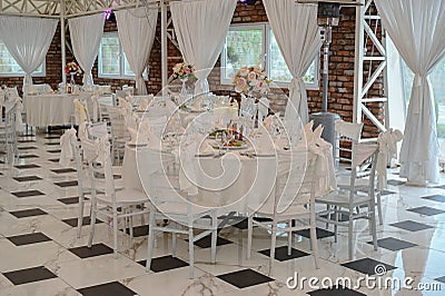 Chairs and table decorated with flowers. Special wedding concept Stock Photo