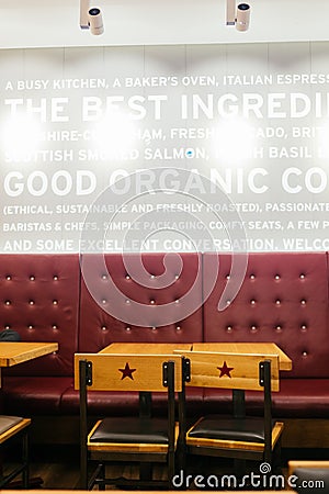 Chairs and tables inside a Pret a Manger cafe Editorial Stock Photo