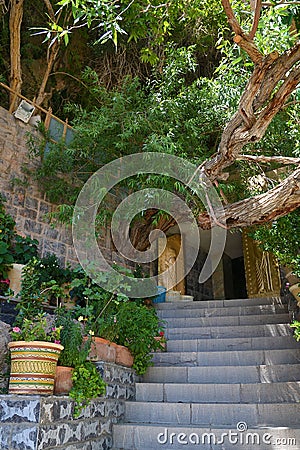 Chak Chak-Ardakan Zorastrian Shrine, entrance with brass door embossed with Zoroastrian symbol, Iran Stock Photo