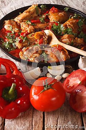 Chakhokhbili Chicken with ingredients close-up. vertical Stock Photo