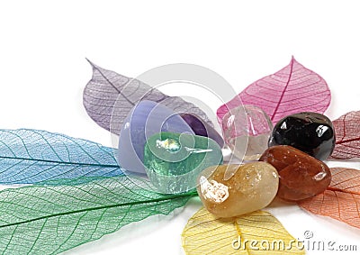 Chakra Crystals on skeleton leaves Stock Photo