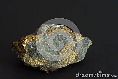 Chalcopyrite mineral on black background Stock Photo