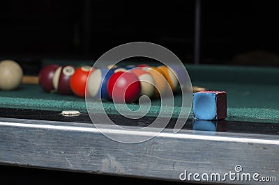 Chalk block on biliard table Stock Photo