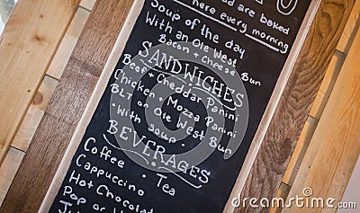 Chalk board with a menu of food and beverages. Stock Photo