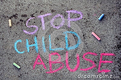 chalk drawing: words STOP CHILD ABUSE Stock Photo