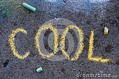 Chalk drawing: Yellow word COOL Stock Photo