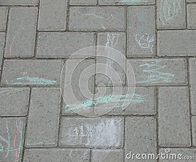 Chalk drawings on a paved surface Stock Photo