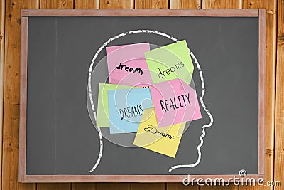 Chalk head with dreams and reality post it notes Stock Photo