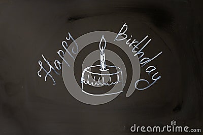 Chalk inscription happy birthday cupcake with candle Stock Photo