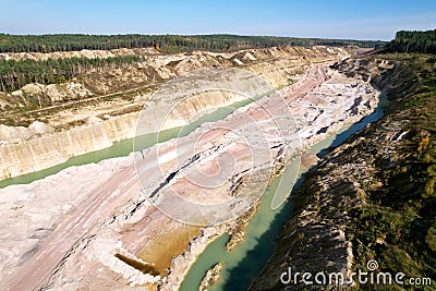 Chalk structure on artificial mountain after open pit development. Extraction of chalk and limestone in open cast for construction Stock Photo