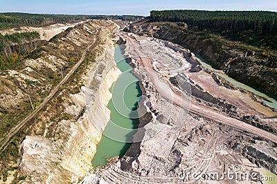 Chalk structure on artificial mountain after open pit development. Extraction of chalk and limestone in open cast for construction Stock Photo