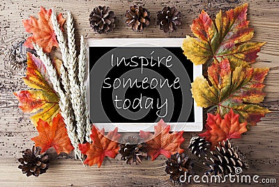 Chalkboard With Autumn Decoration, Quote Inspire Someone Today Stock Photo