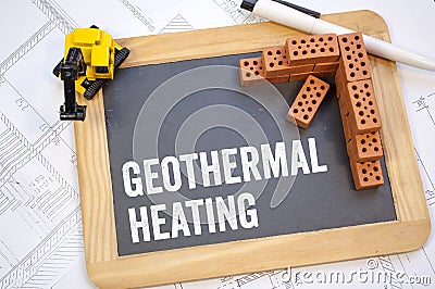 Chalkboard with blueprint or construction plan and little bricks with geothermal heating Stock Photo