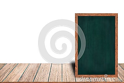 Chalkboard wood frame blackboard sign menu on wooden table is laying on white background with copy space. Stock Photo