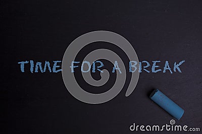 Chalkboard with the words time for a break Stock Photo