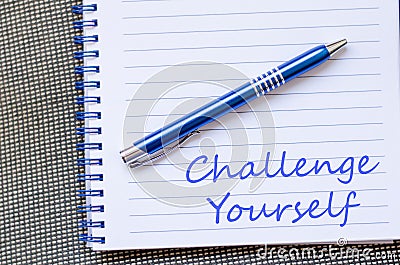 Challenge yourself write on notebook Stock Photo